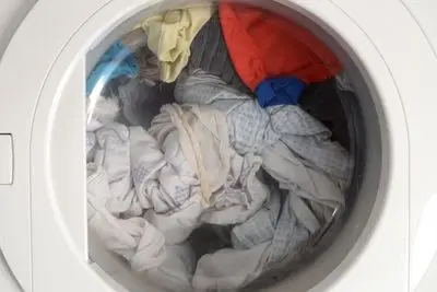 can you put wet clothes in the dryer